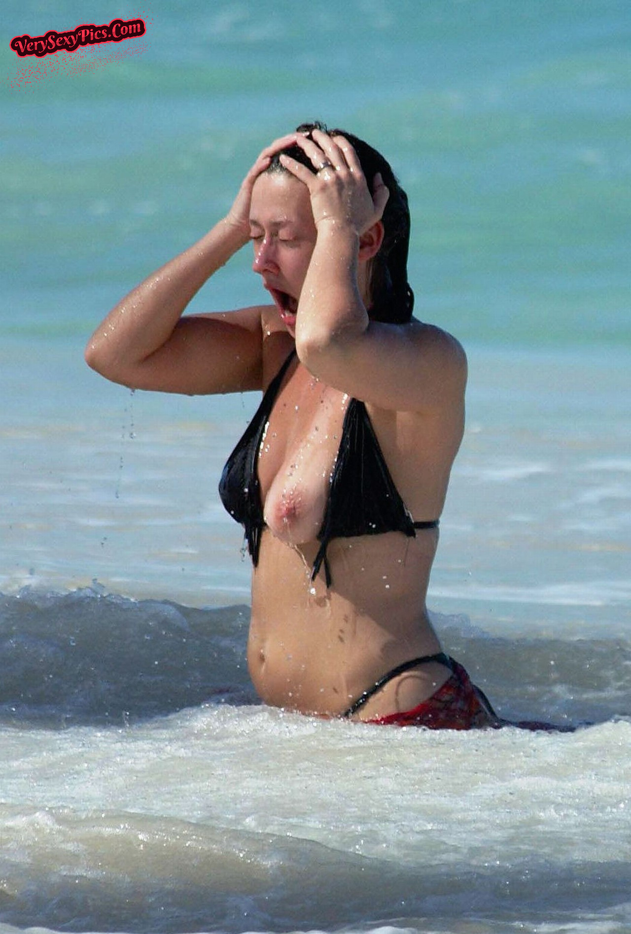 Boobs Slip Out Of Bikini