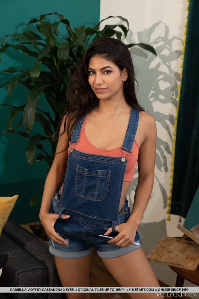 Young brunette Daniella Vioti doffs short overalls for great