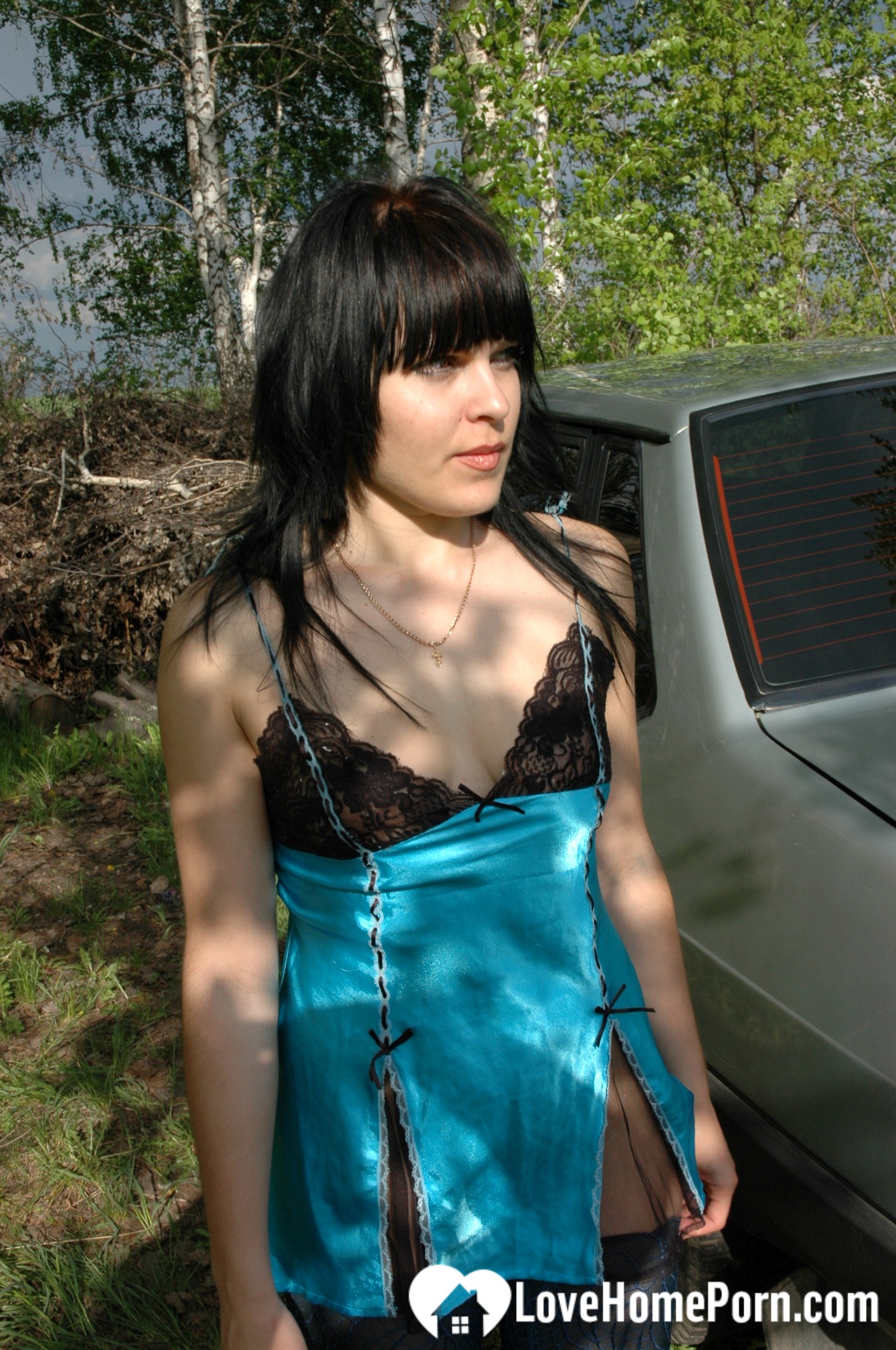 Lusty mom in lingerie posing in the woods