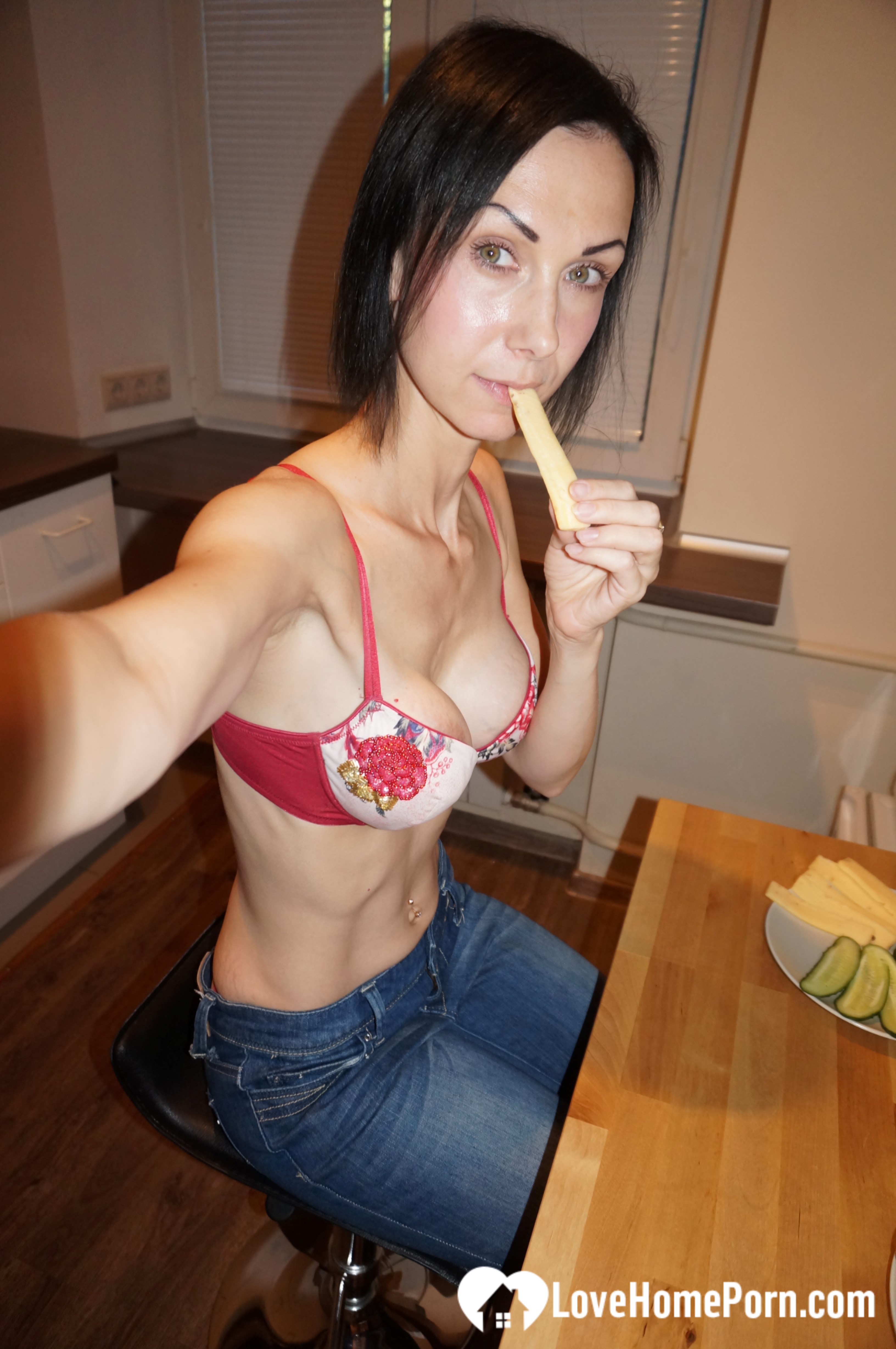 Skinny MILF shows off her fake tits