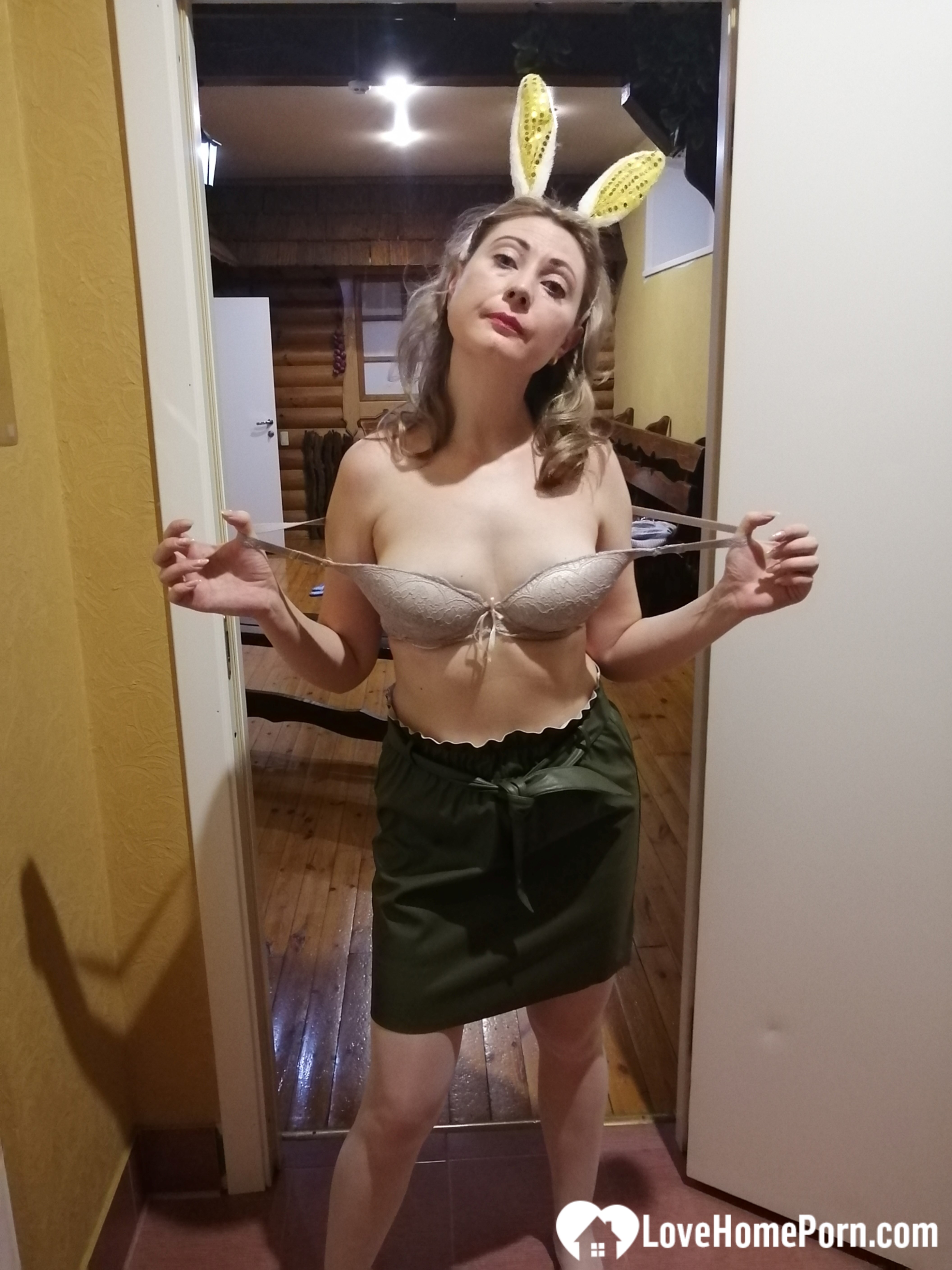 Smoking beauty posing with cute bunny ears