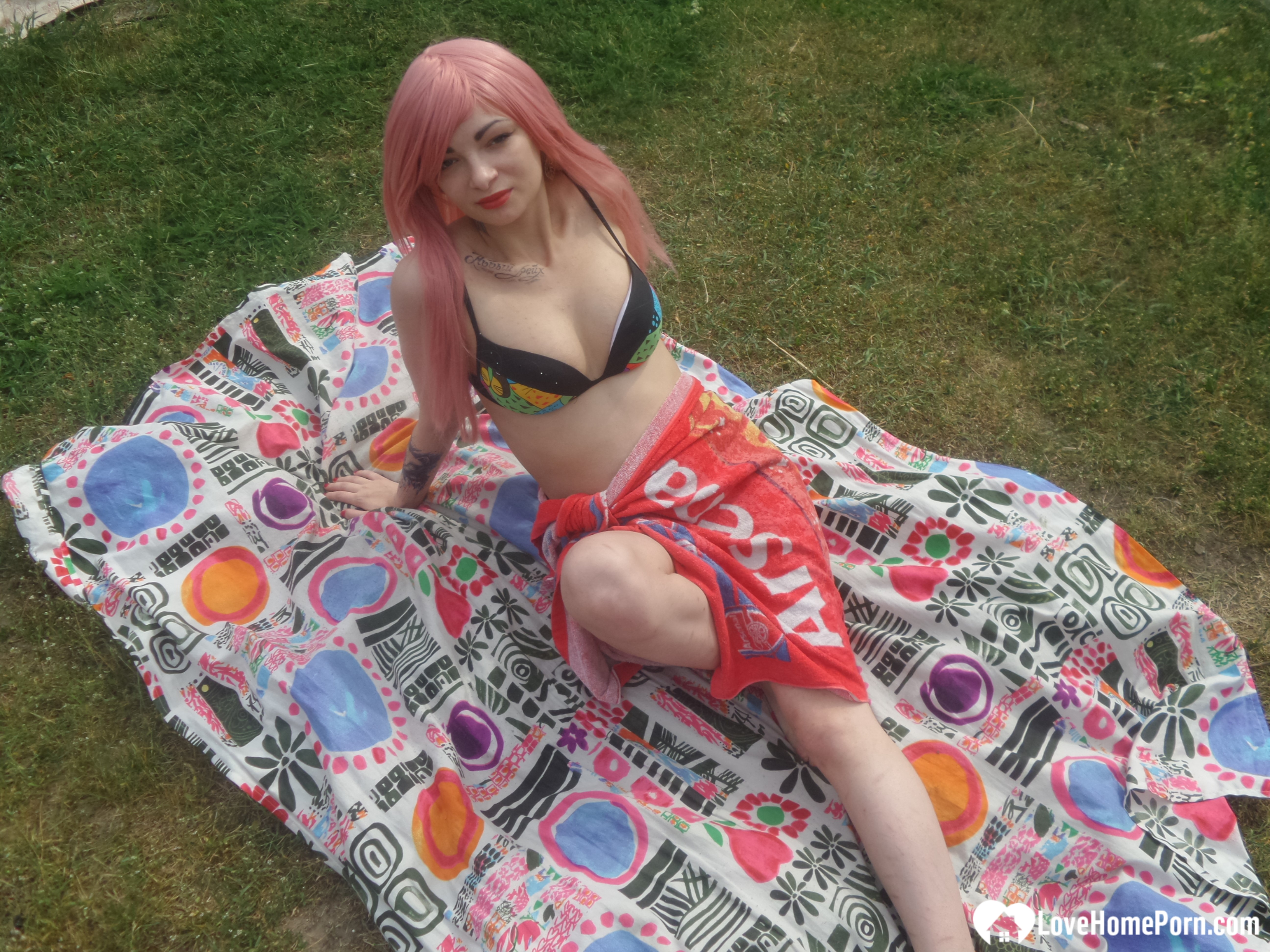 Pink-haired beauty plays with her love tunnel
