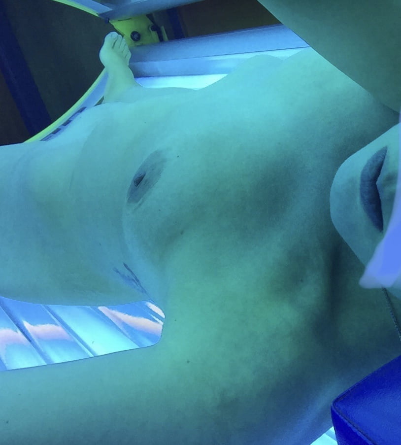 Wife in the tanning bed