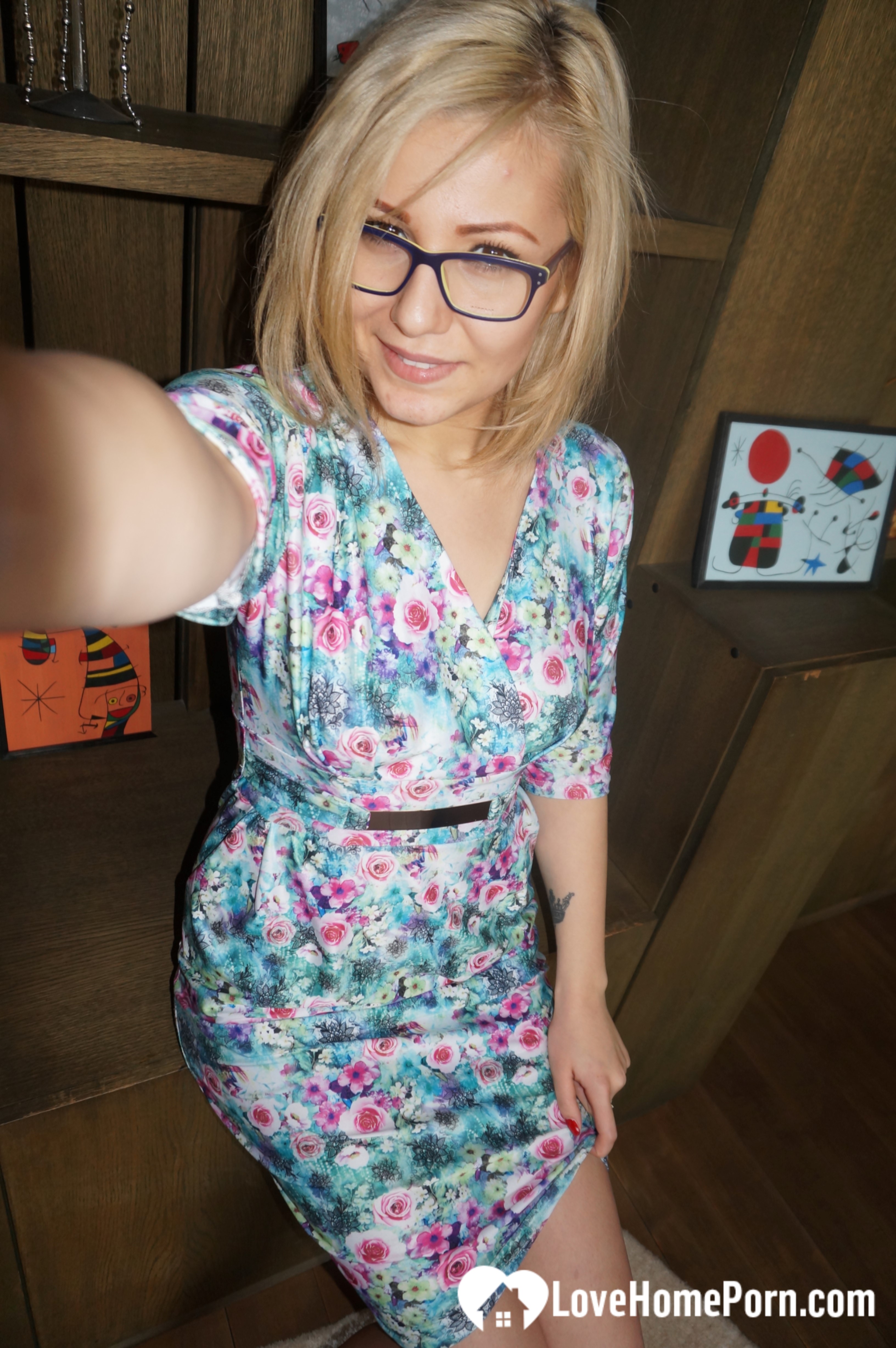 Amateur blonde with glasses exposes her naughty side