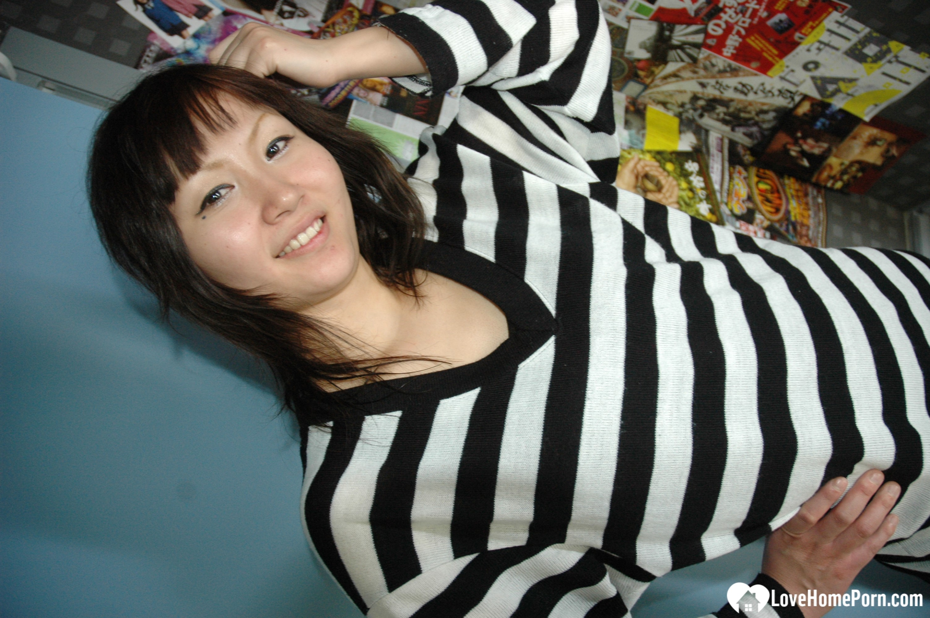 Hot Asian strips pantyhose and does sexy poses