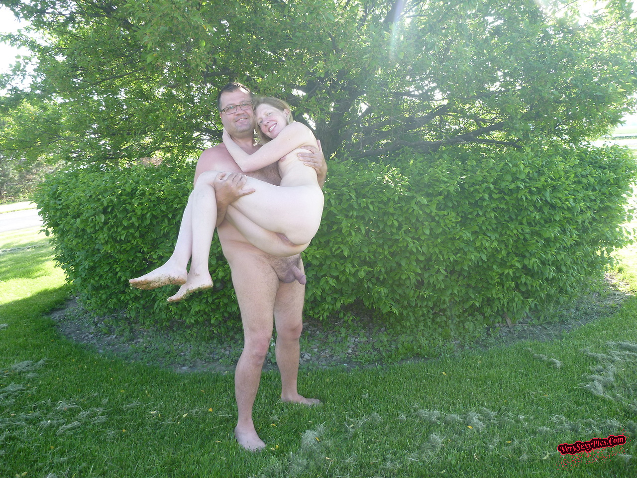 Nudist couple loving life