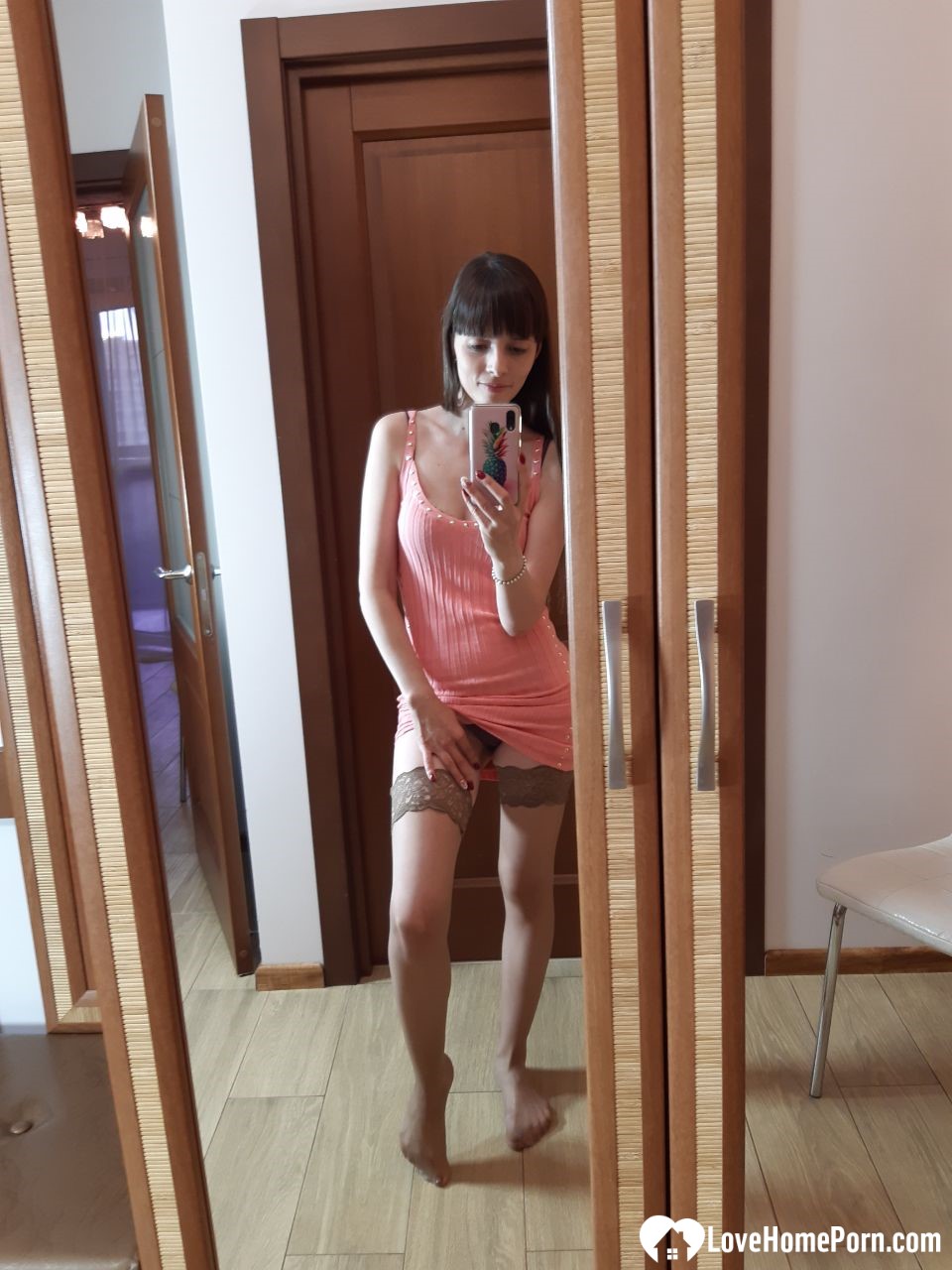 Sexy brunette secretary posing in hot stockings