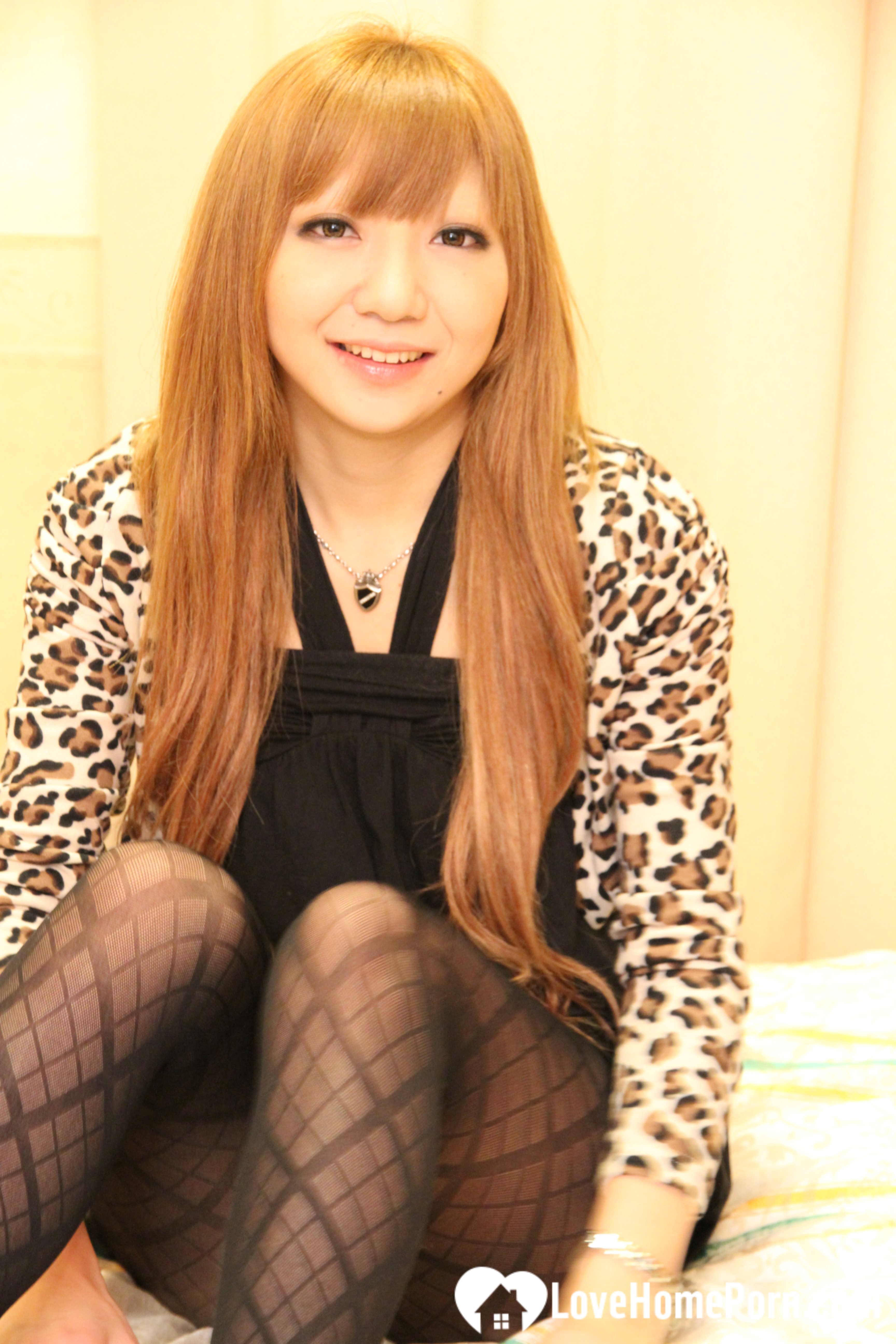 Redhead Asian in pantyhose goes wild on camera
