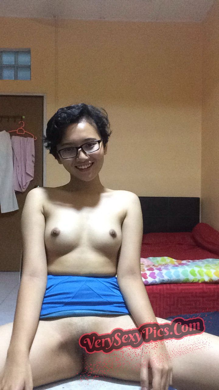 Nerdy Asian Babe Stripping Naked