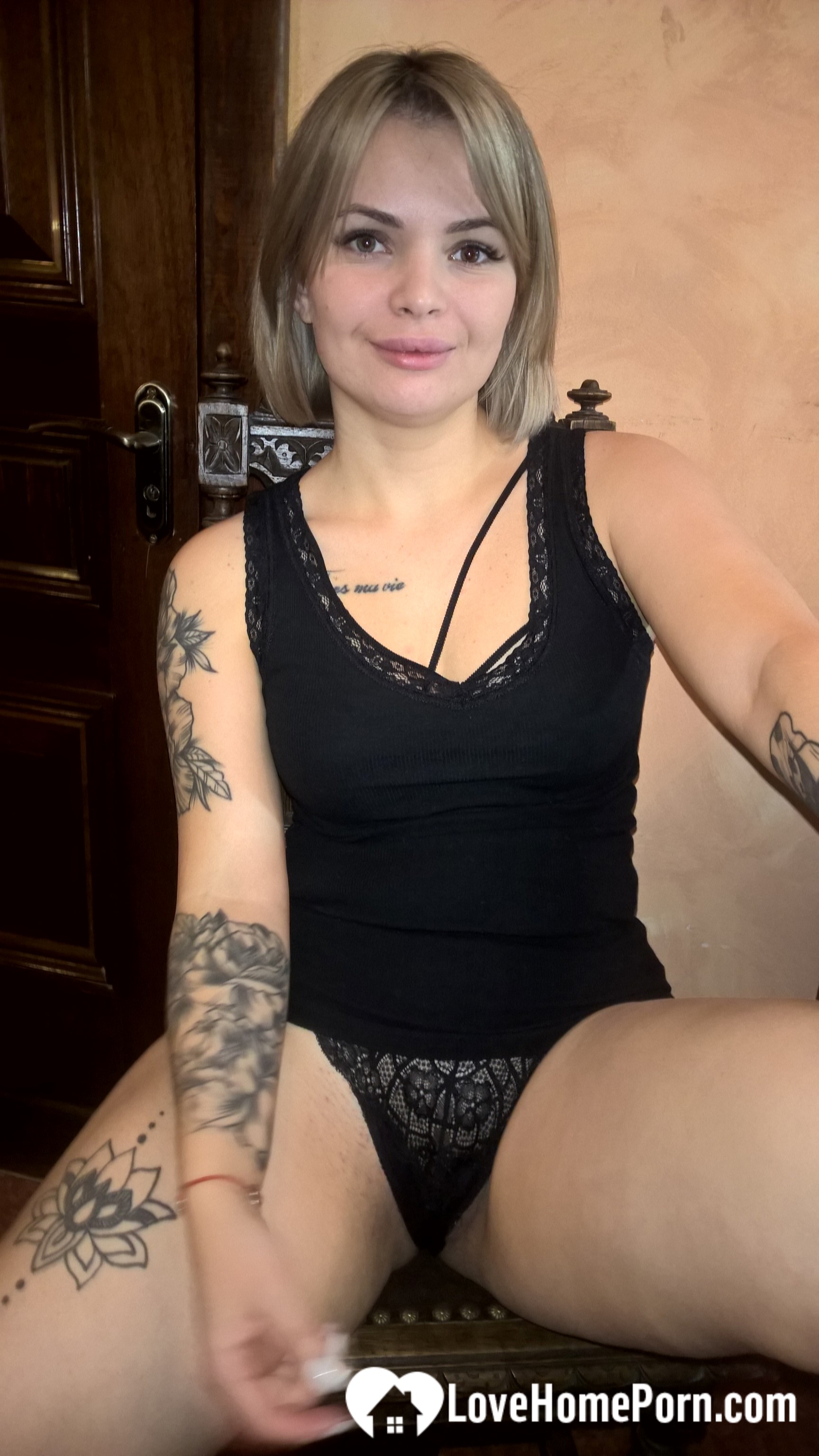 Cute tattooed beauty flashes her amazing tits