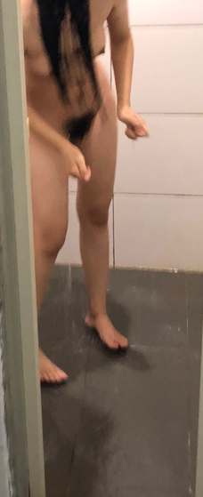 Candidly filmed my girlfriend taking a shower